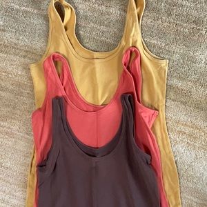 4 tank tops, purchased from Maurice’s. White, brown, rust, mustard